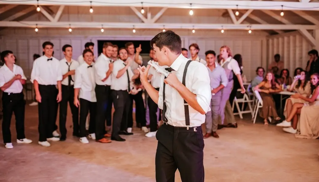 Bride and groom mid-dip on the dance floor at an Abilene wedding DJ'd by Pro DJ's
